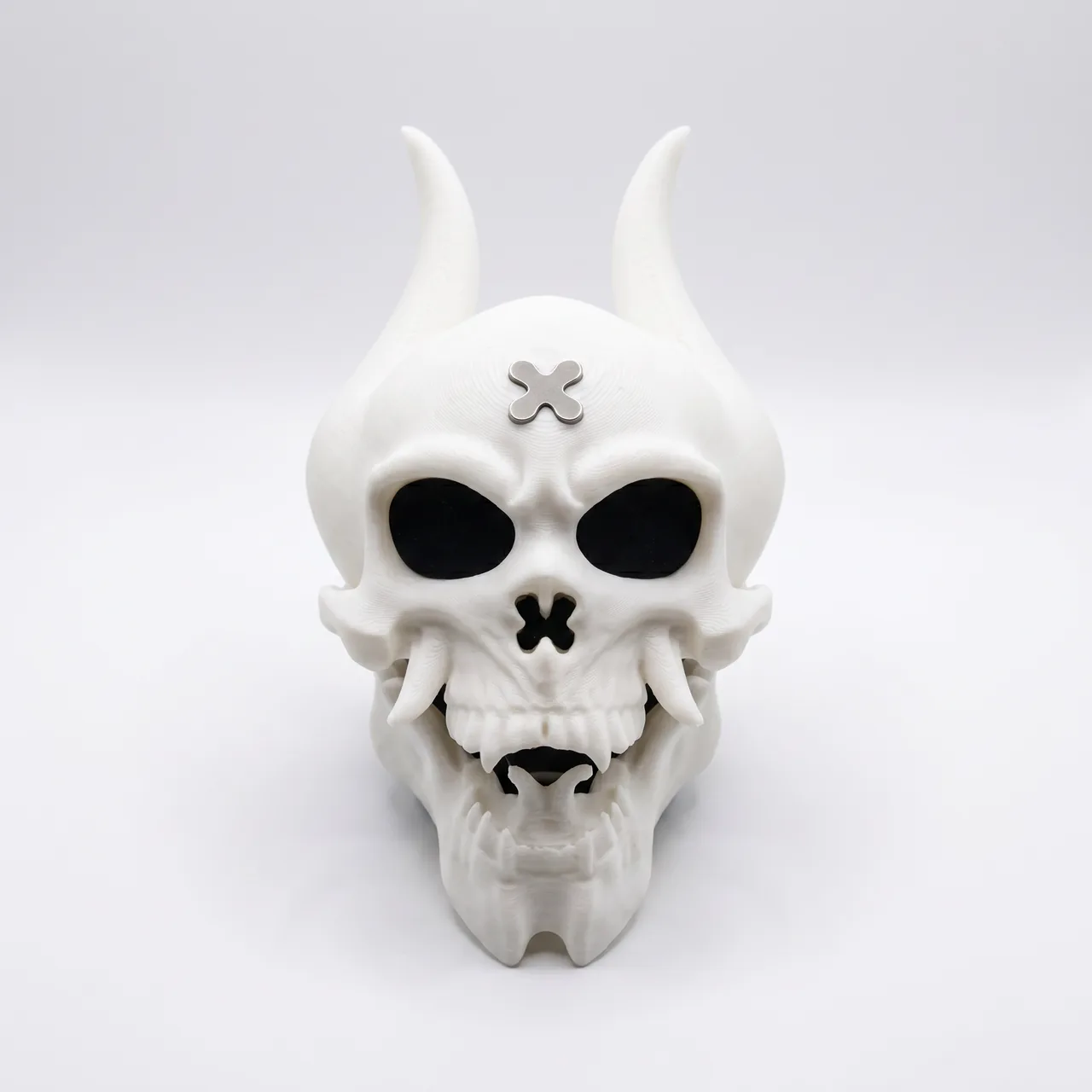 3D-printed horned skull mask with a smooth surface finish