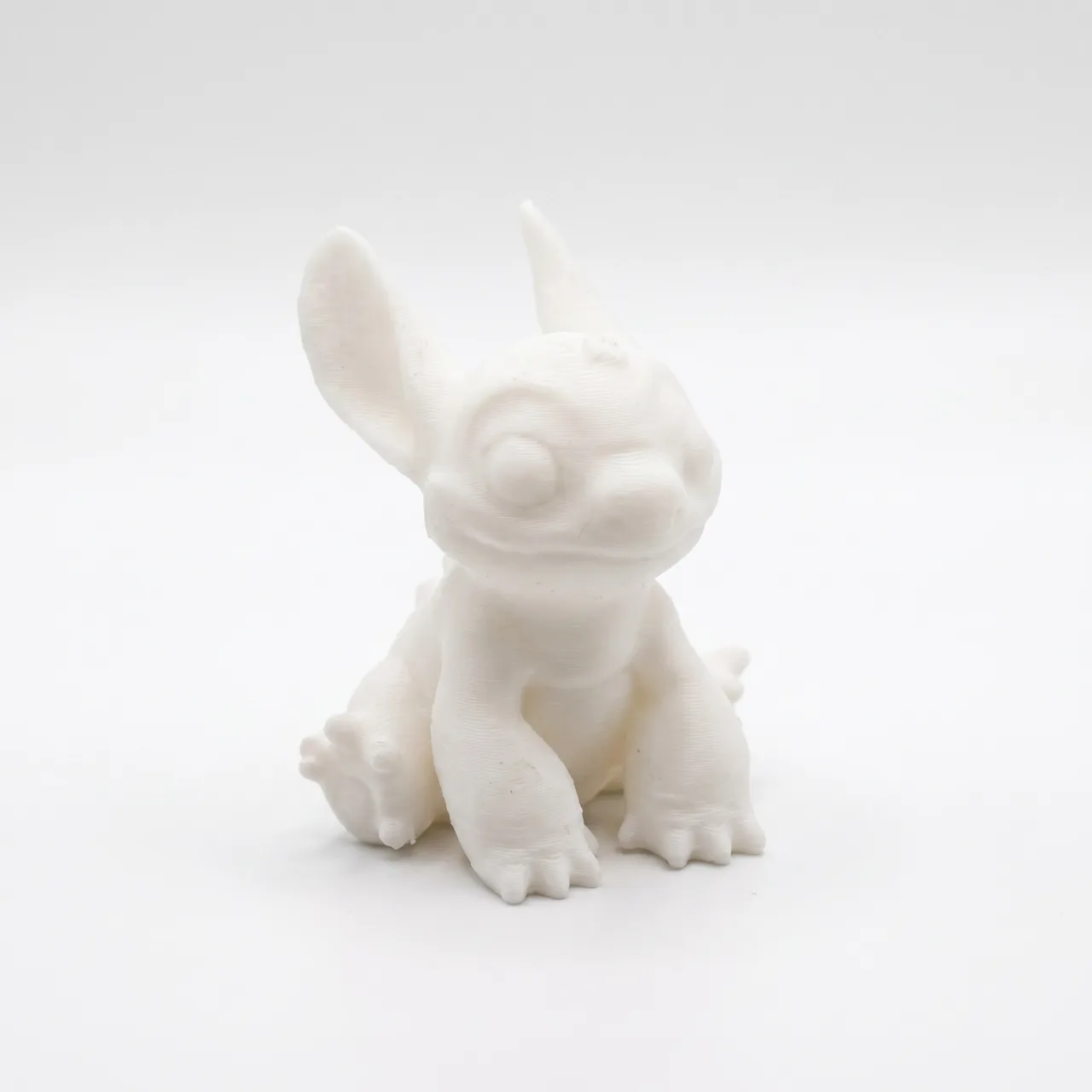 3D-printed baby dragon creature figurine